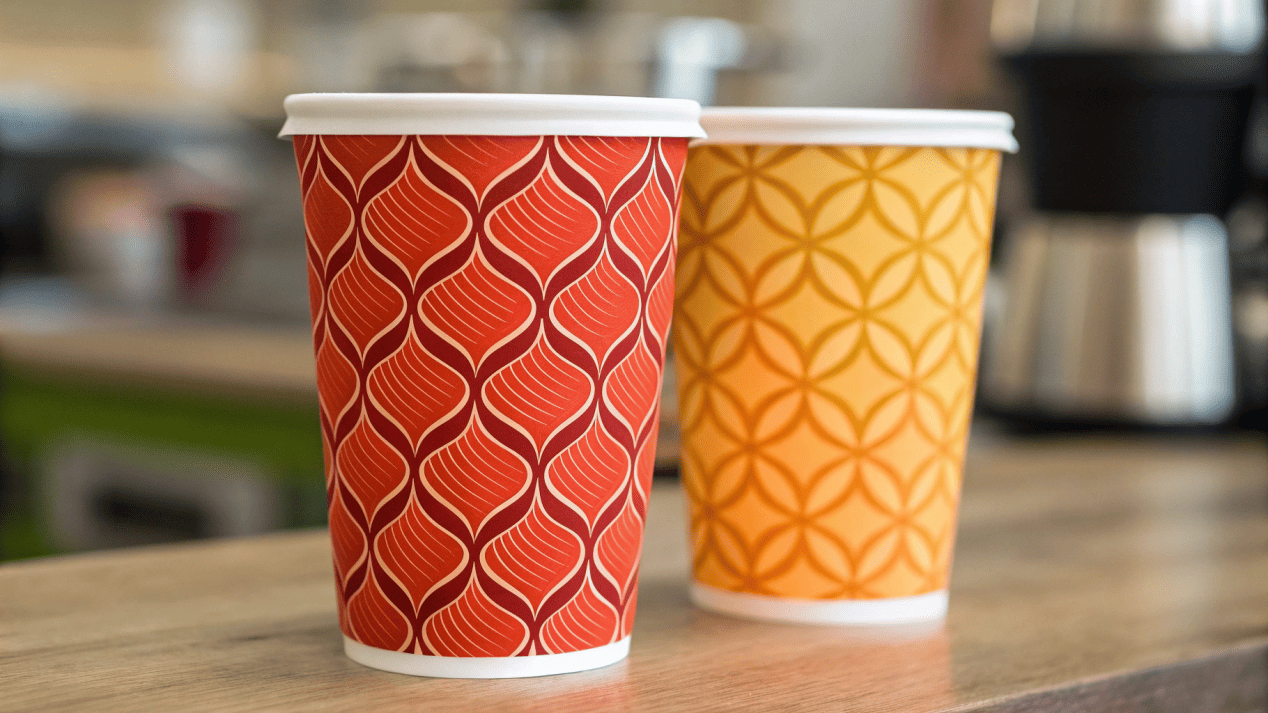 A close-up of a beautifully printed logo on both a single wall and a double wall cup