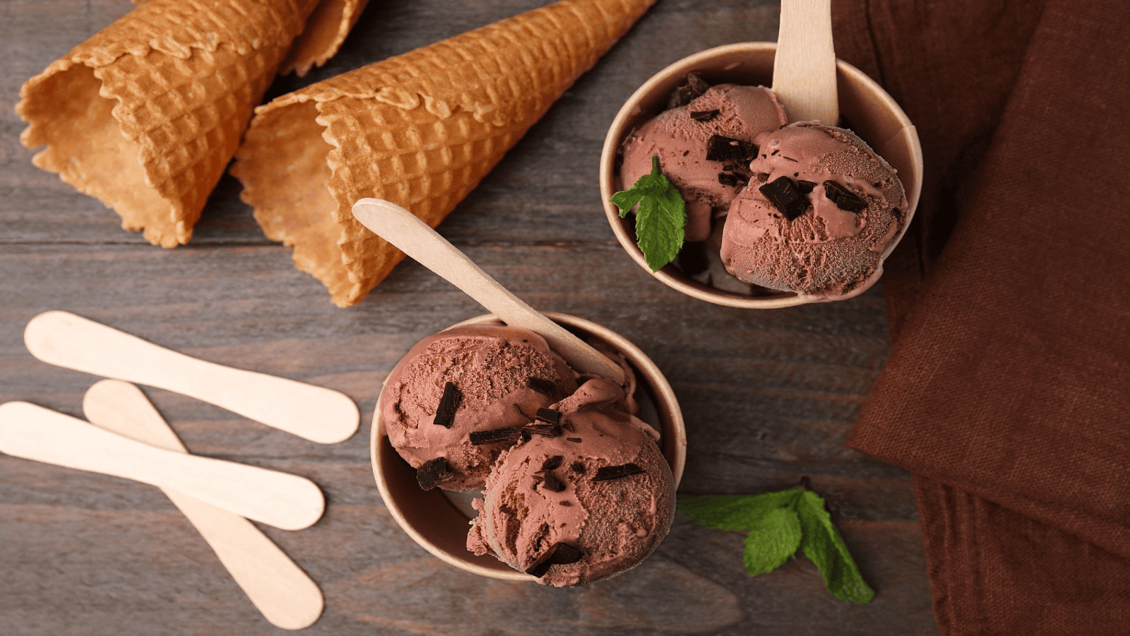 small ice cream cups with wooden spoons