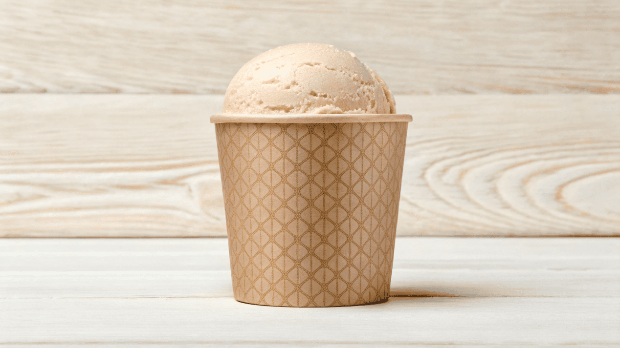 Eco-Friendly Kraft Paper Ice Cream Cups A scoop of artisanal ice cream in a beautifully printed Kraft paper cup.