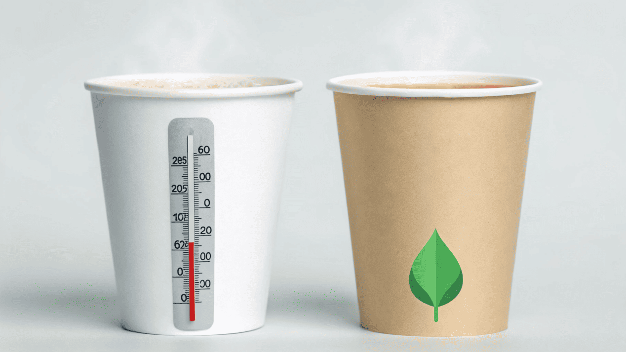Heat Resistance of PLA vs. PE Liners A thermometer next to a PE-coated cup and a heat-resistant PLA-coated cup, both holding steaming liquid.