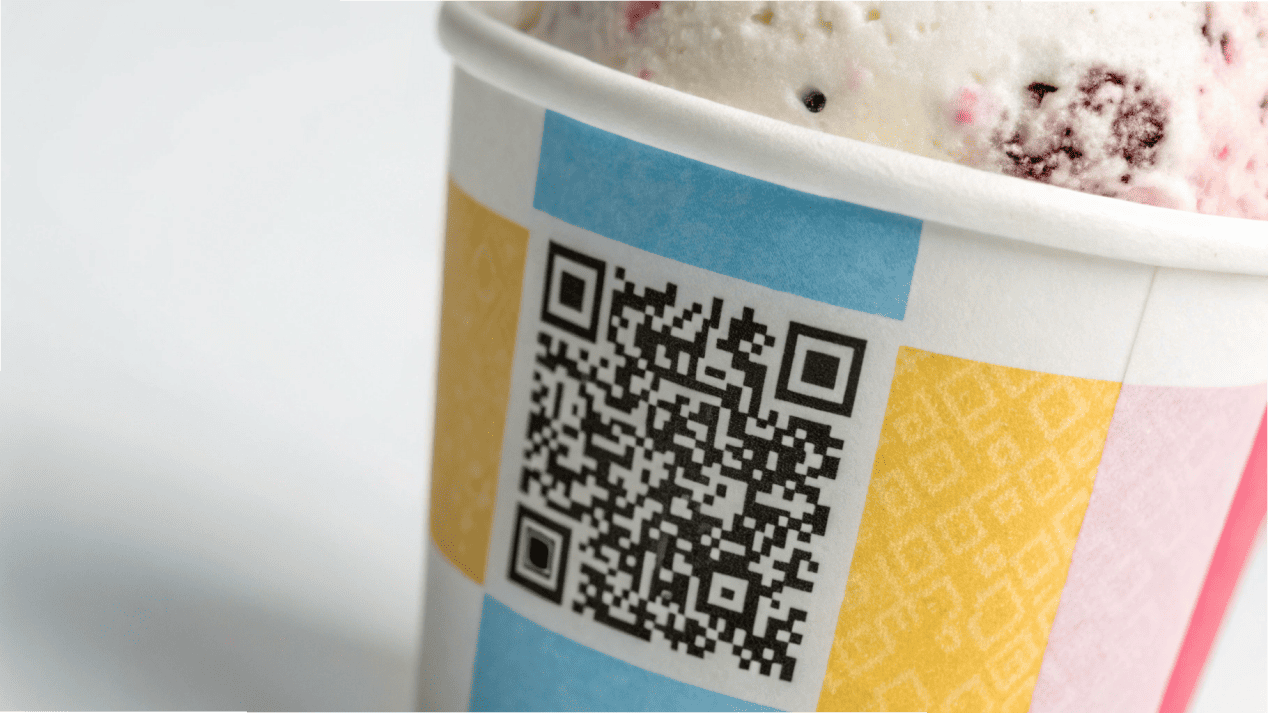 Boosting Sales with Custom Ice Cream Cups A custom ice cream cup with a QR code for a loyalty program printed on the side.