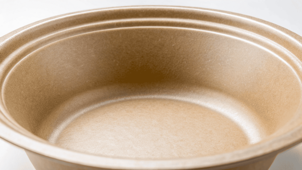 Heat-Proof Coating for Microwavable Paper Cups A close-up of the inside of a microwavable paper bowl, showing the smooth, heat-proof coating.