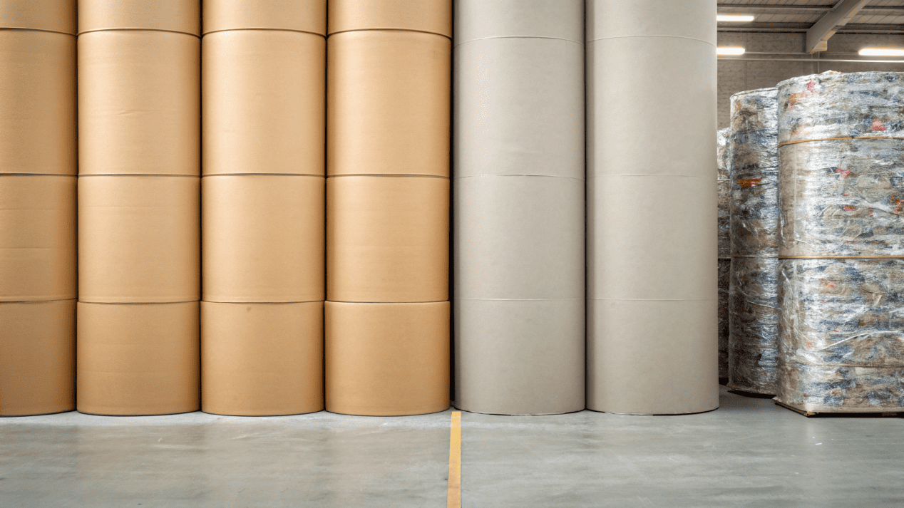 Virgin Board vs. Recycled Paper for Food Contact An image showing a clean roll of virgin paperboard on one side and a pile of mixed recycled paper on the other, with a clear "X" over the recycled pile.