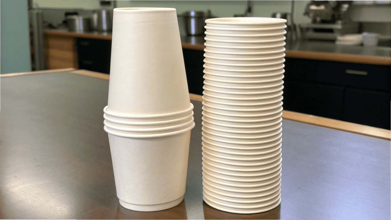 A diagram comparing a poorly tapered cup stack (short, wide) to a well-tapered cup stack (tall, dense).