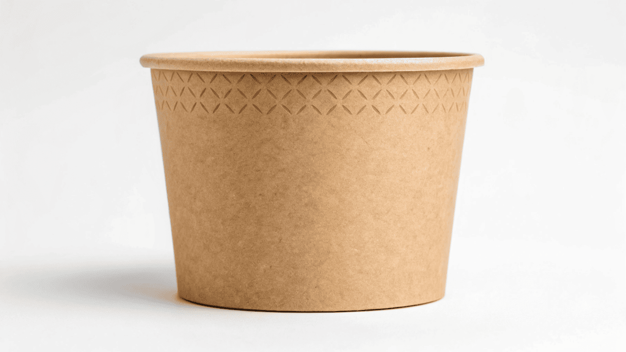 A close-up of an ice cream cup with a 'Buy 9, Get 1 Free' punch card printed on its side.