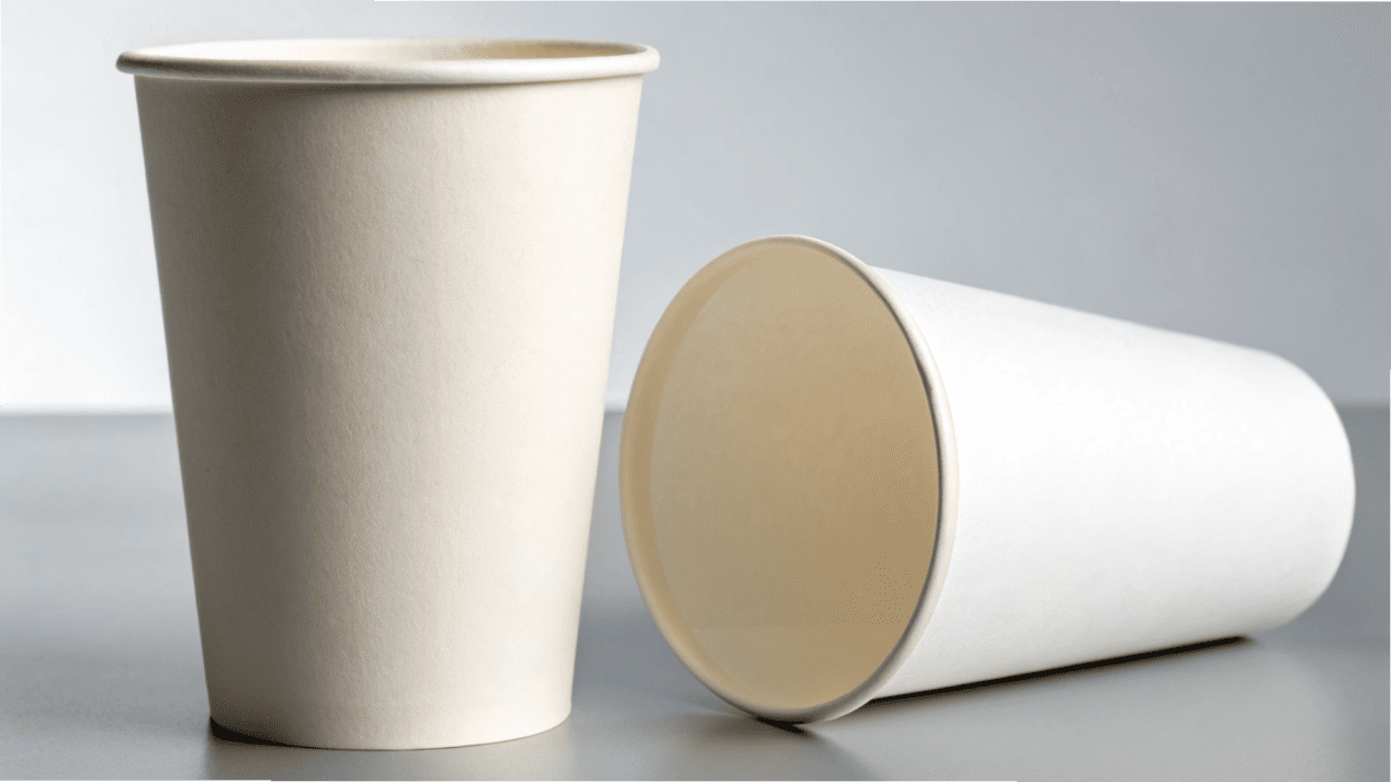 A close-up of a high-quality, sturdy paper cup next to a flimsy one.